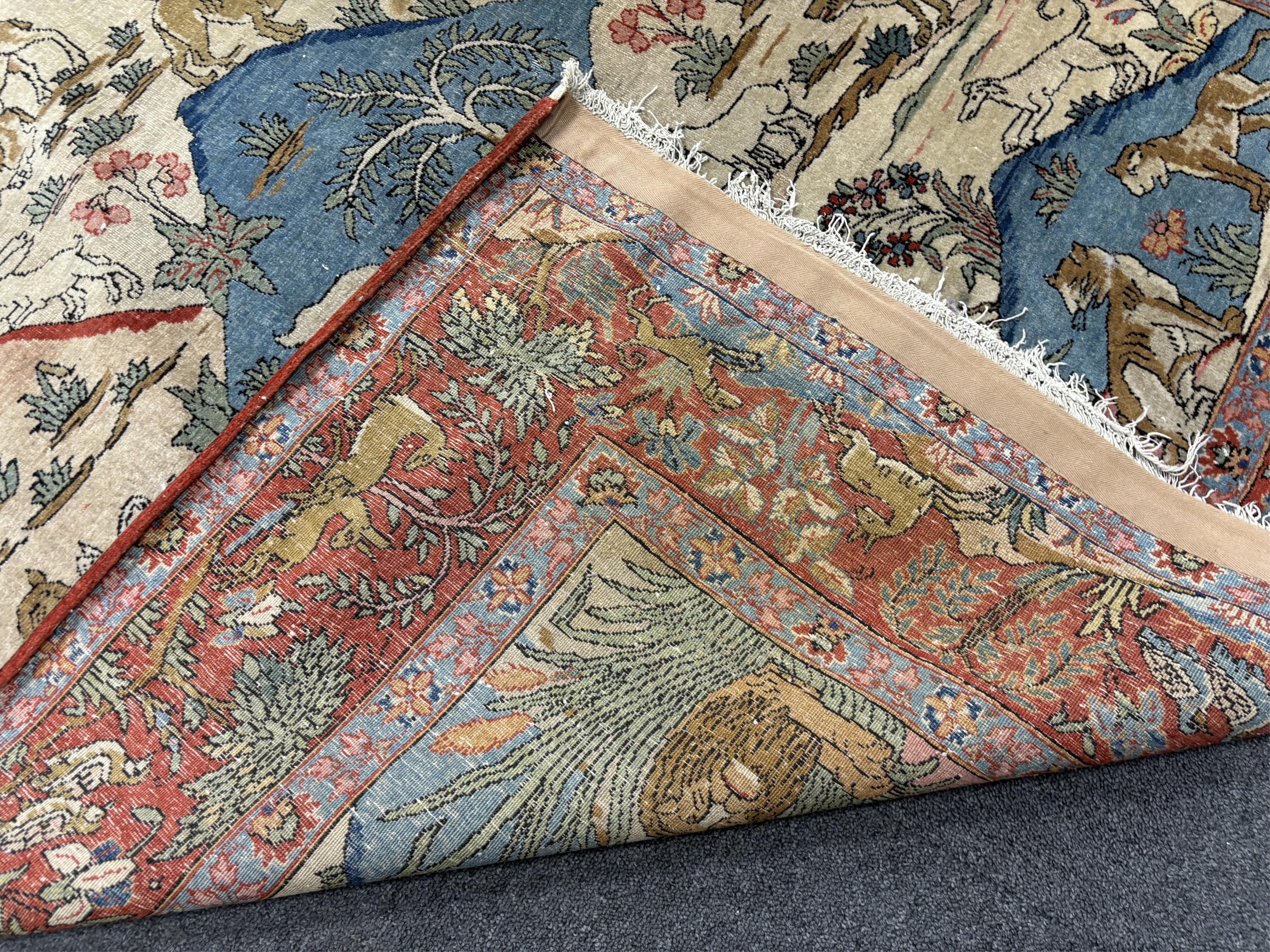 An early 20th century Tabriz pictorial rug, 194 x 136cm